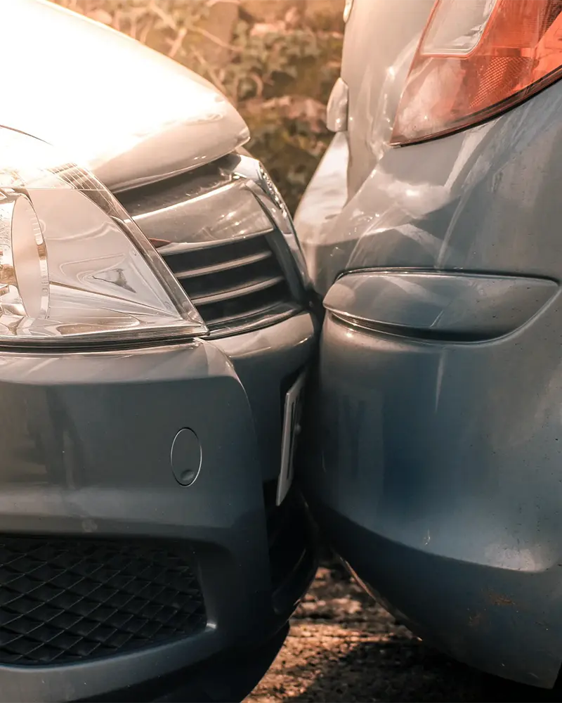 Fender-bender accident damage requiring bumper and auto body repair