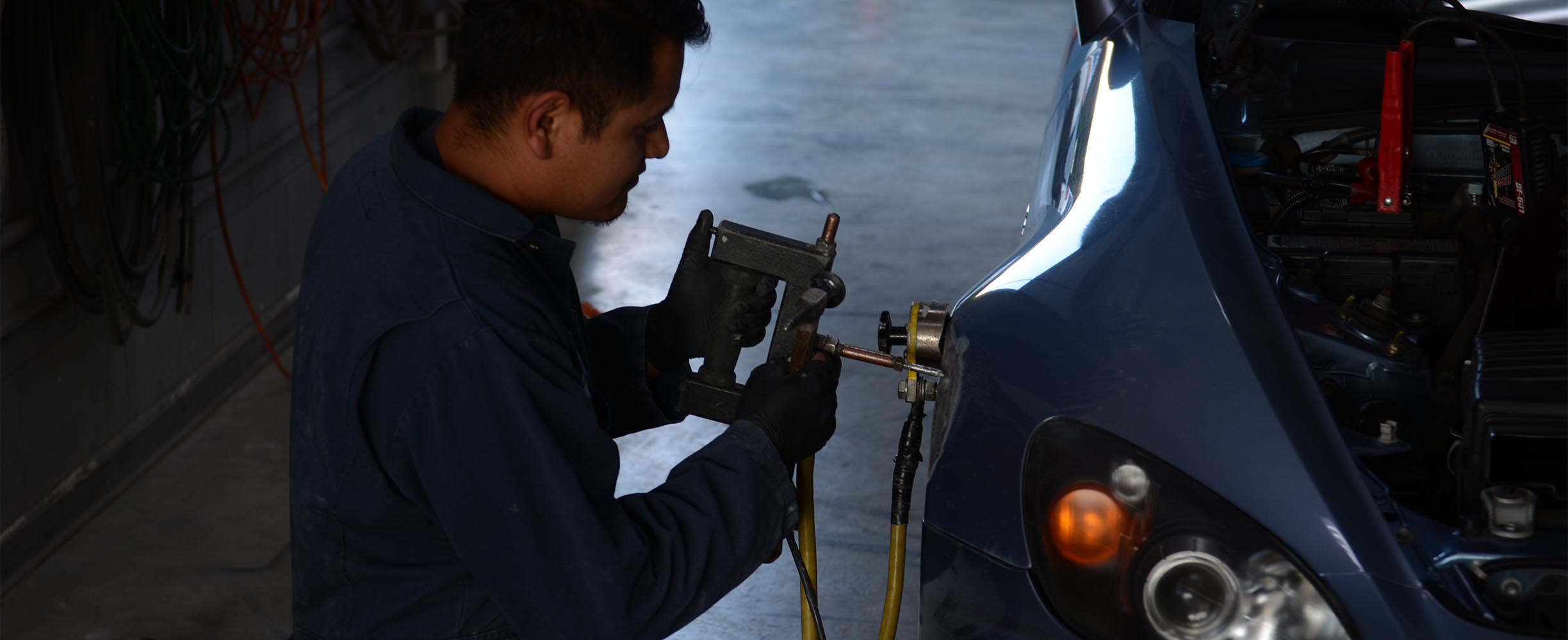 Collision damage being evaluated for auto body repair