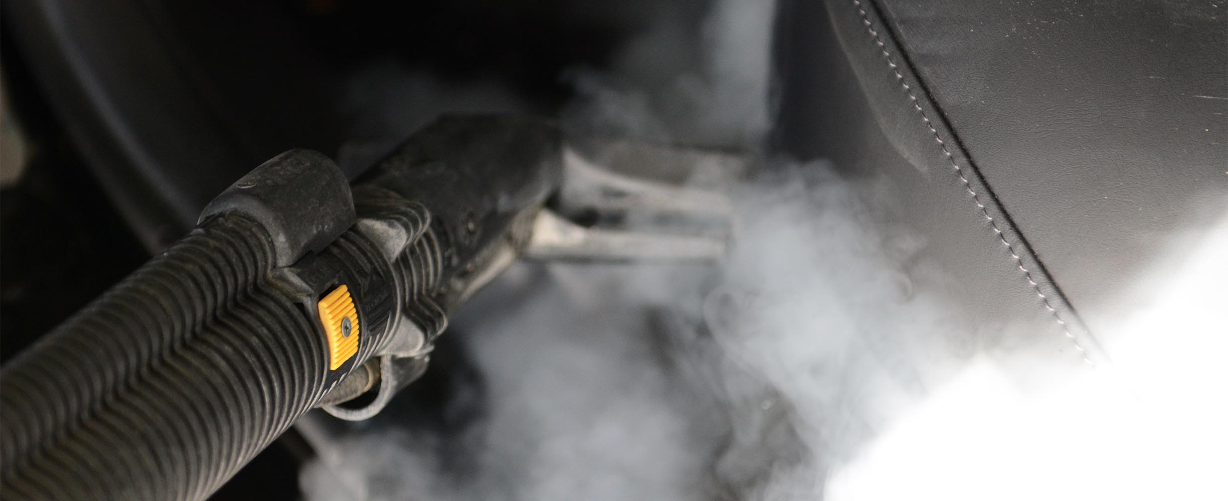 Carpet steaming as part of the interior auto detailing in san Bruno, California.